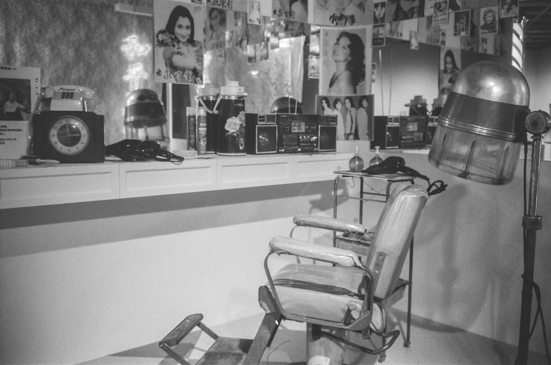 black and white photo of barbers chair