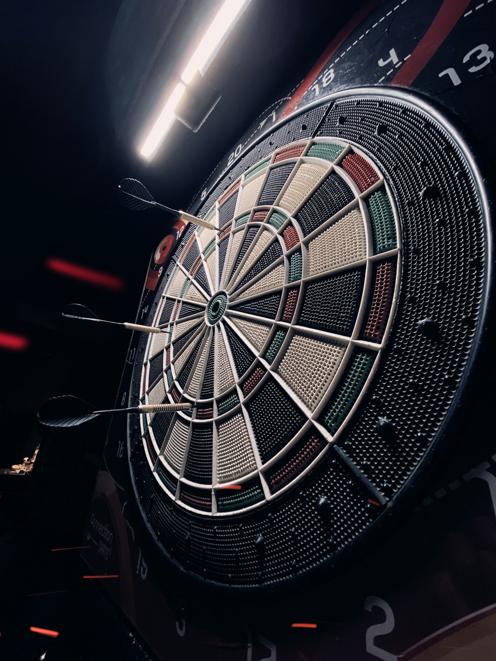 a close up of a dart board in a room