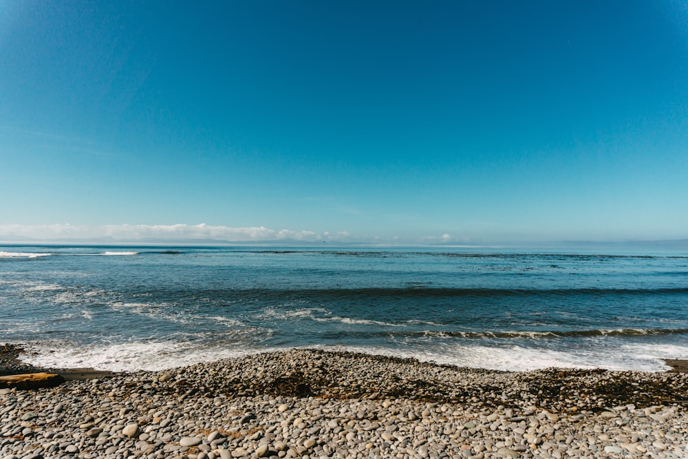 blue sea under blue sky during daytime