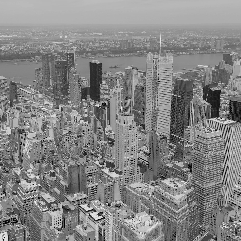 grayscale photo of city buildings