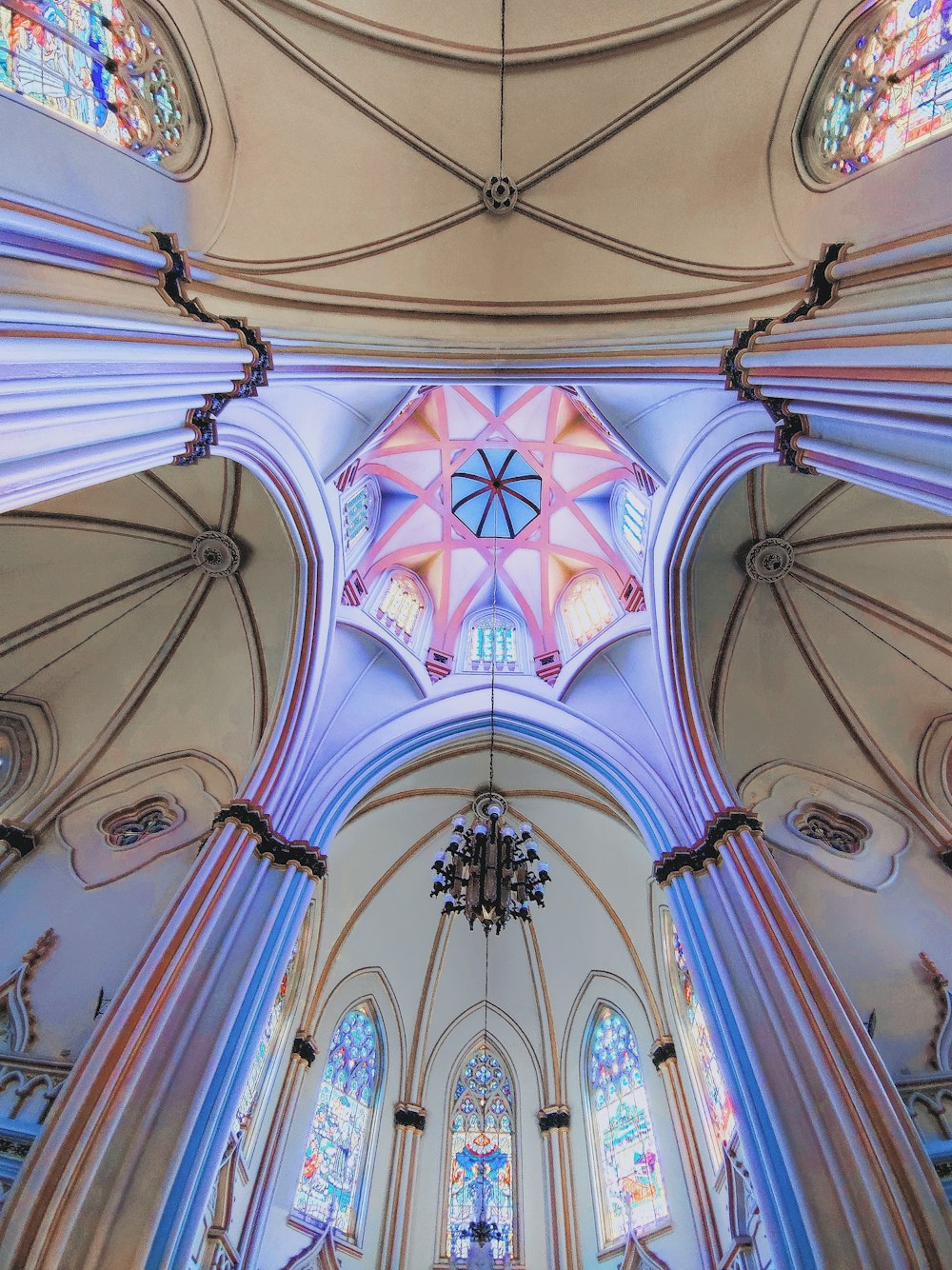 white and blue ceiling with glass windows