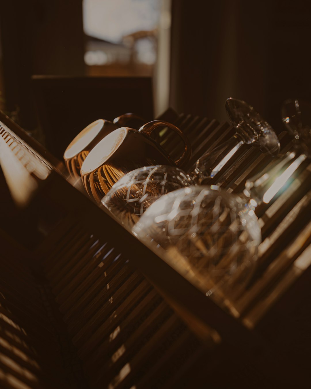 clear glass bowl on brown wooden table