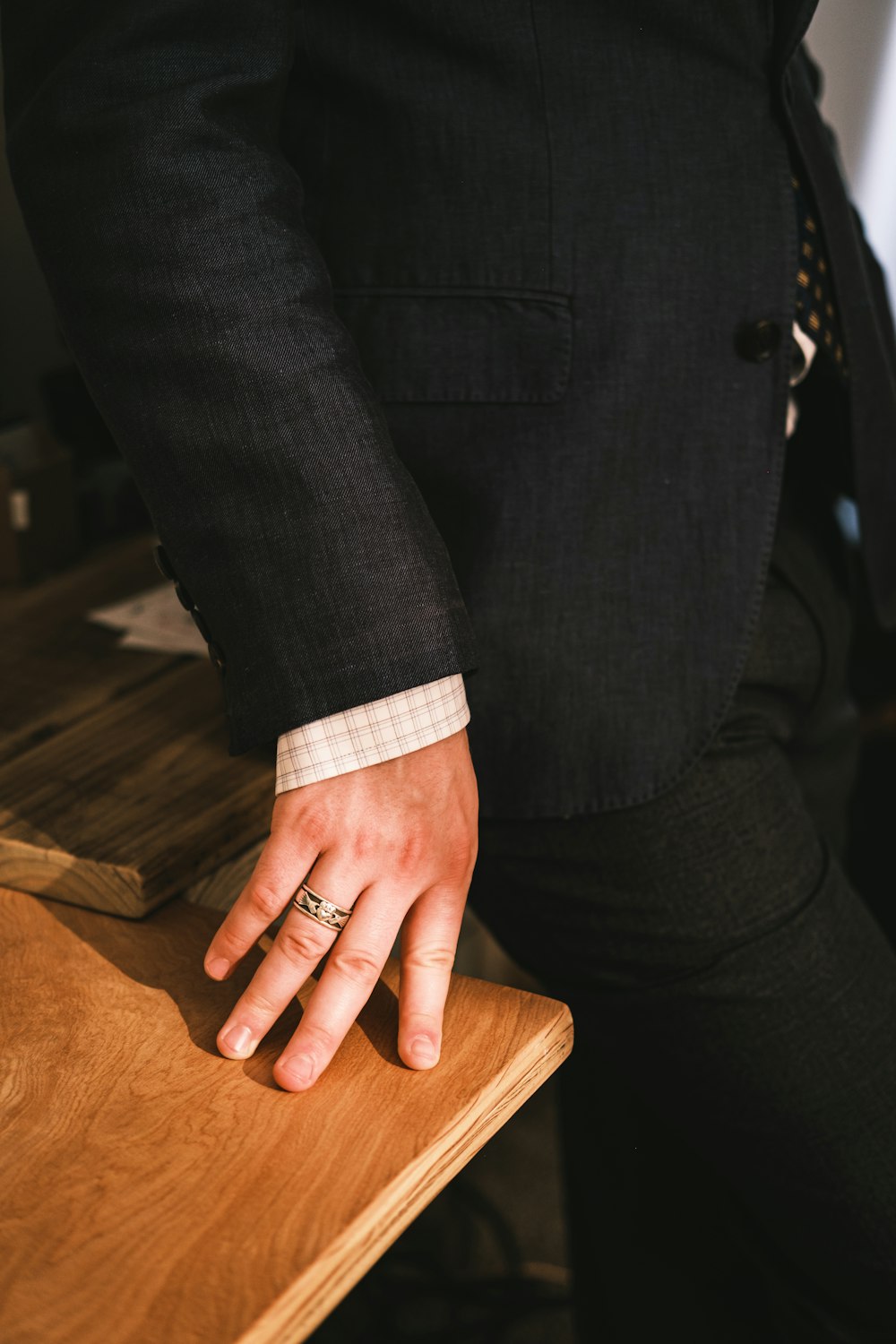 person in black suit jacket