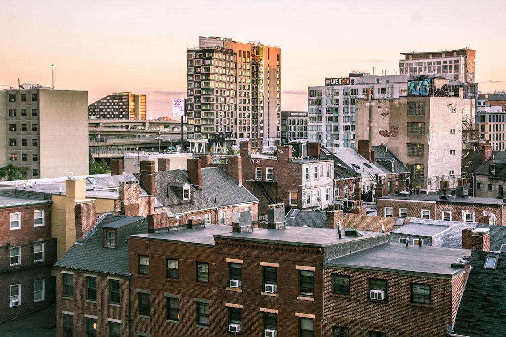 brown and white concrete buildings during daytime