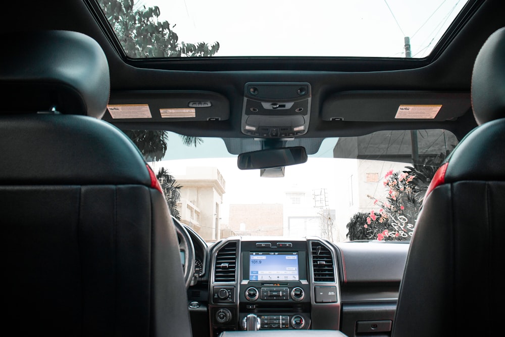 the inside of a car with a view of the dashboard