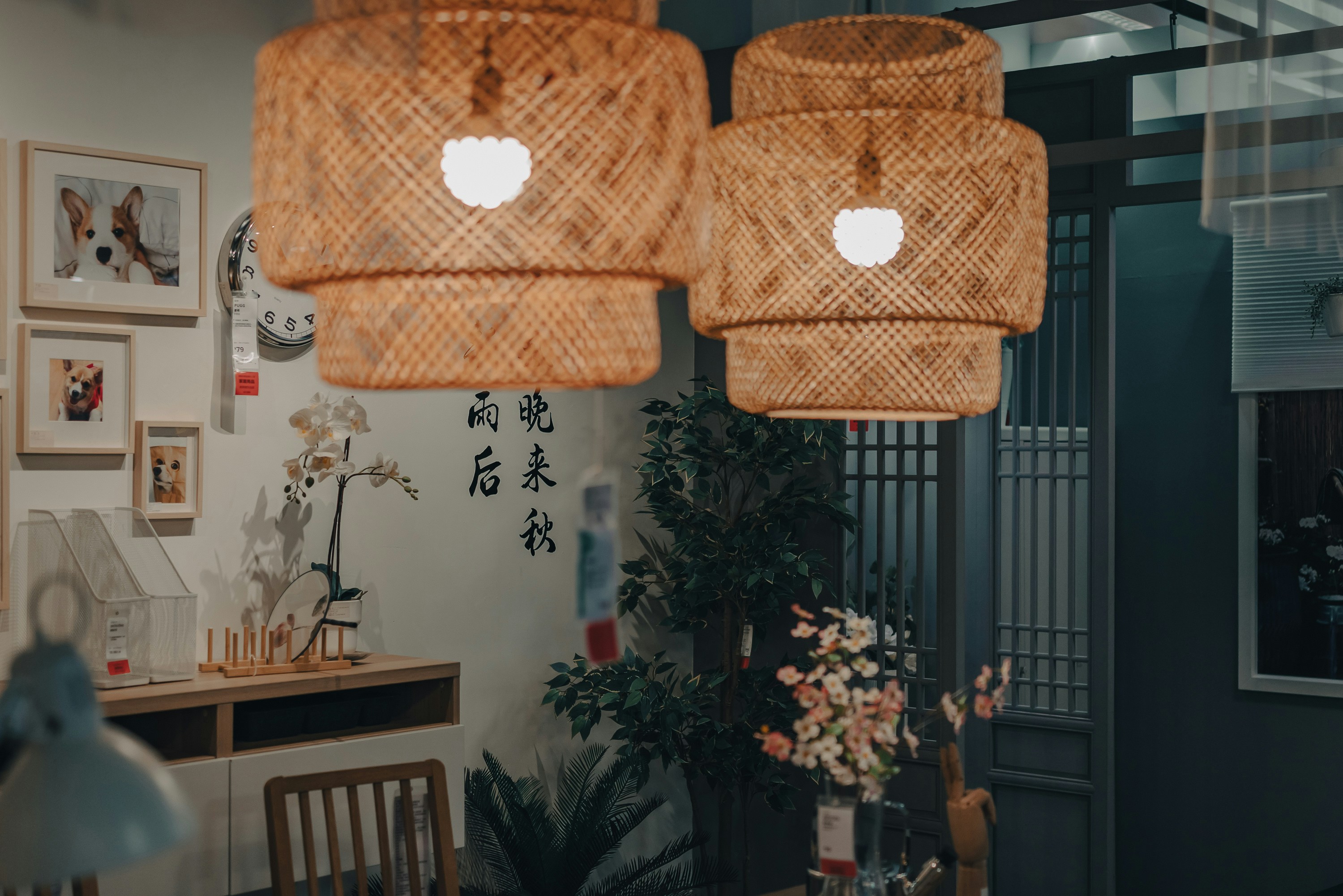 Boho rattan pendant light hanging over dining area