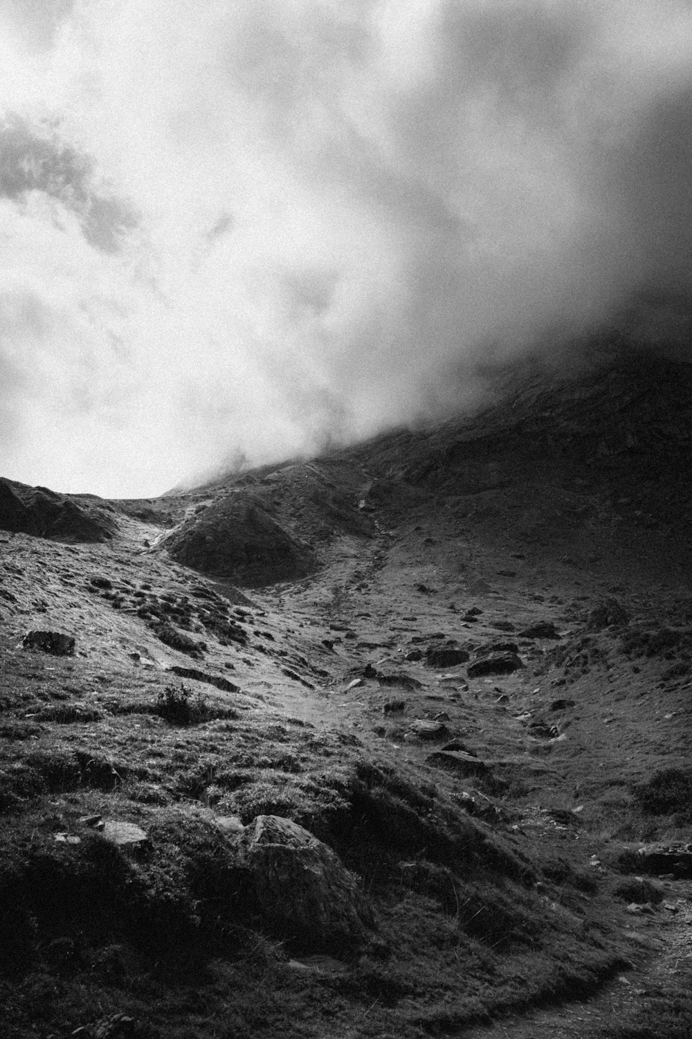 a black and white photo of a mountain