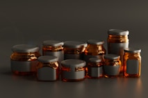a group of jars with lids on a table
