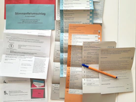 Official stamps and translated documents laid out neatly on a table.
