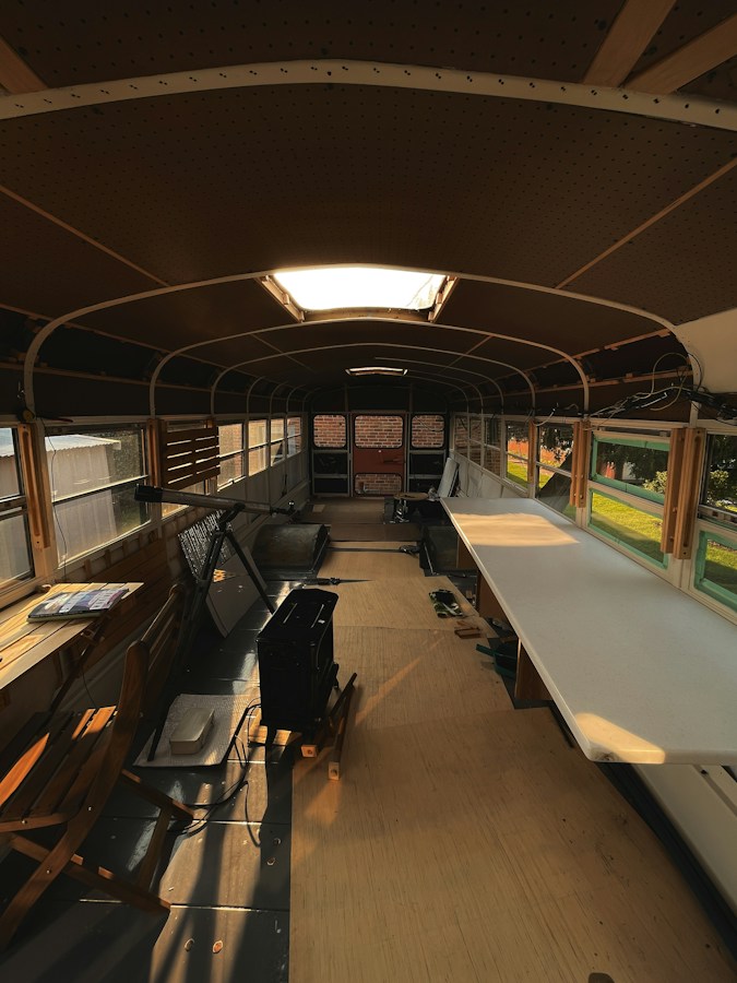 People working on a vehicle conversion project