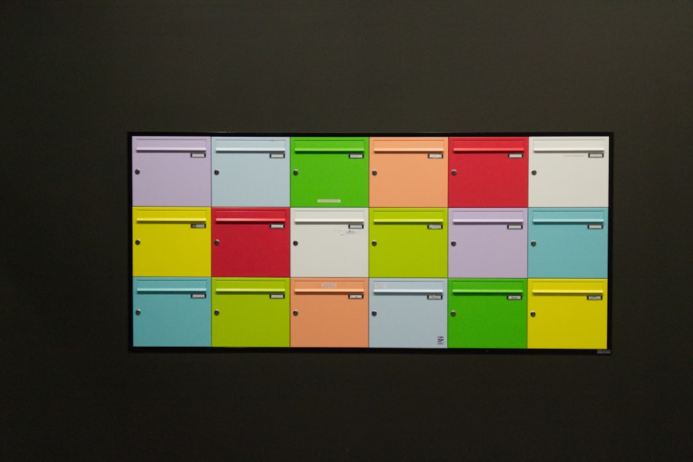 a multicolored file cabinet with a black background