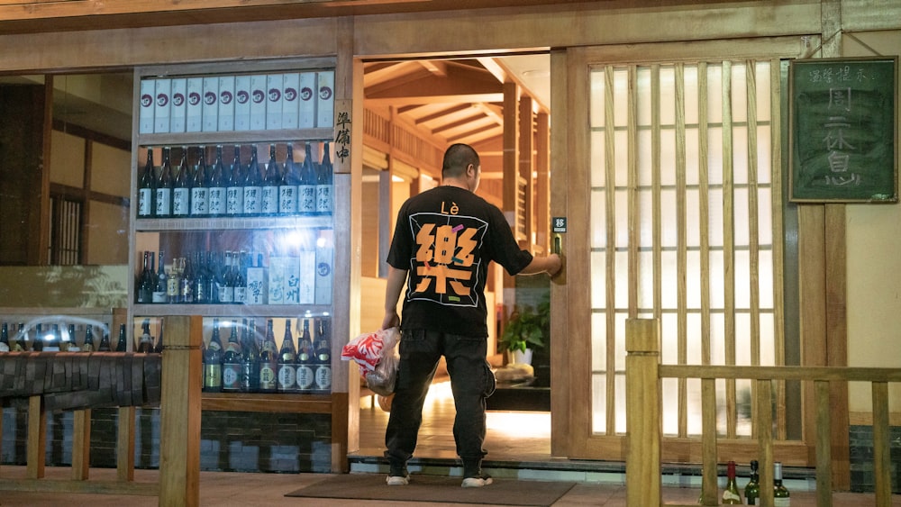 a man standing in a doorway of a building