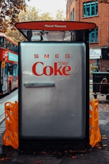 white refrigerator on the street