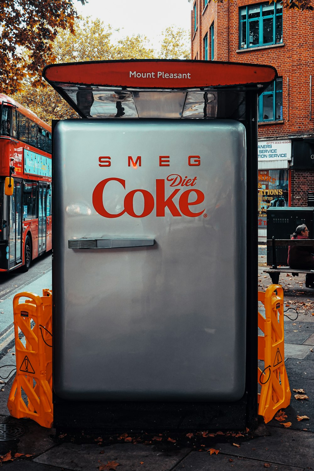 white refrigerator on the street