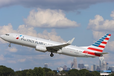 an american airlines jet taking off from an airport