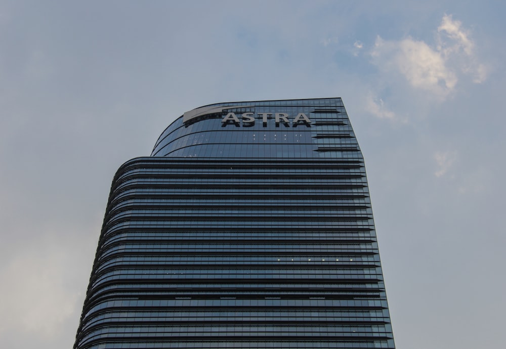 a tall building with a sky background