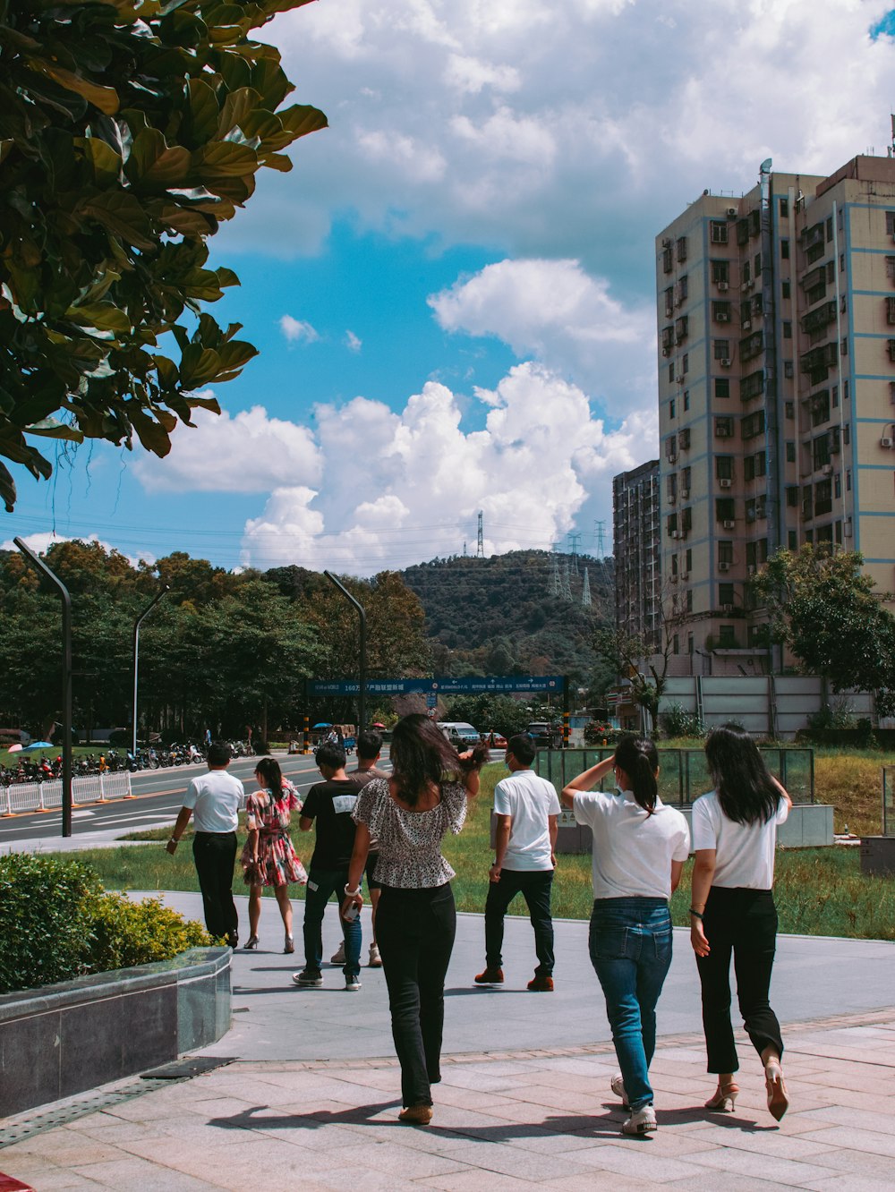 people walking on sidewalk during daytime