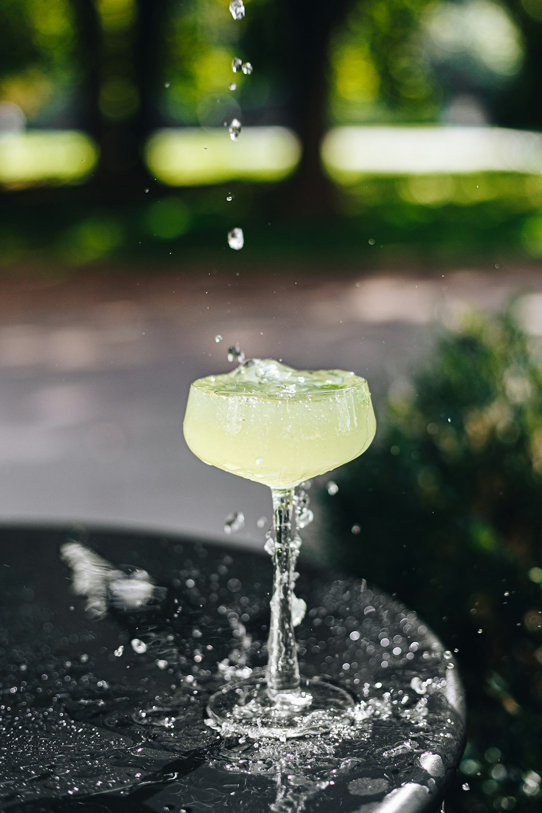 water splash on green leaf