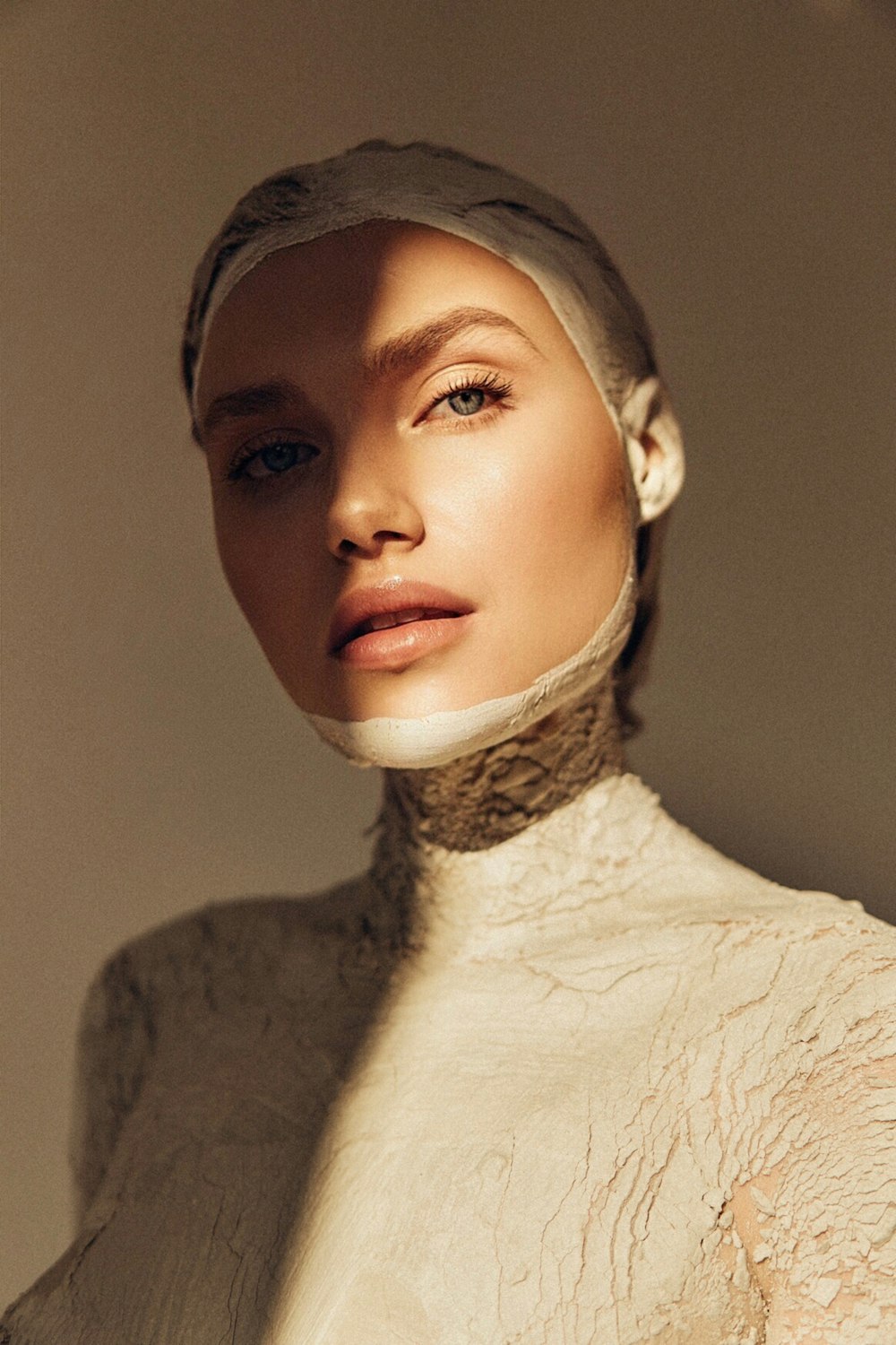 woman in white turtleneck shirt