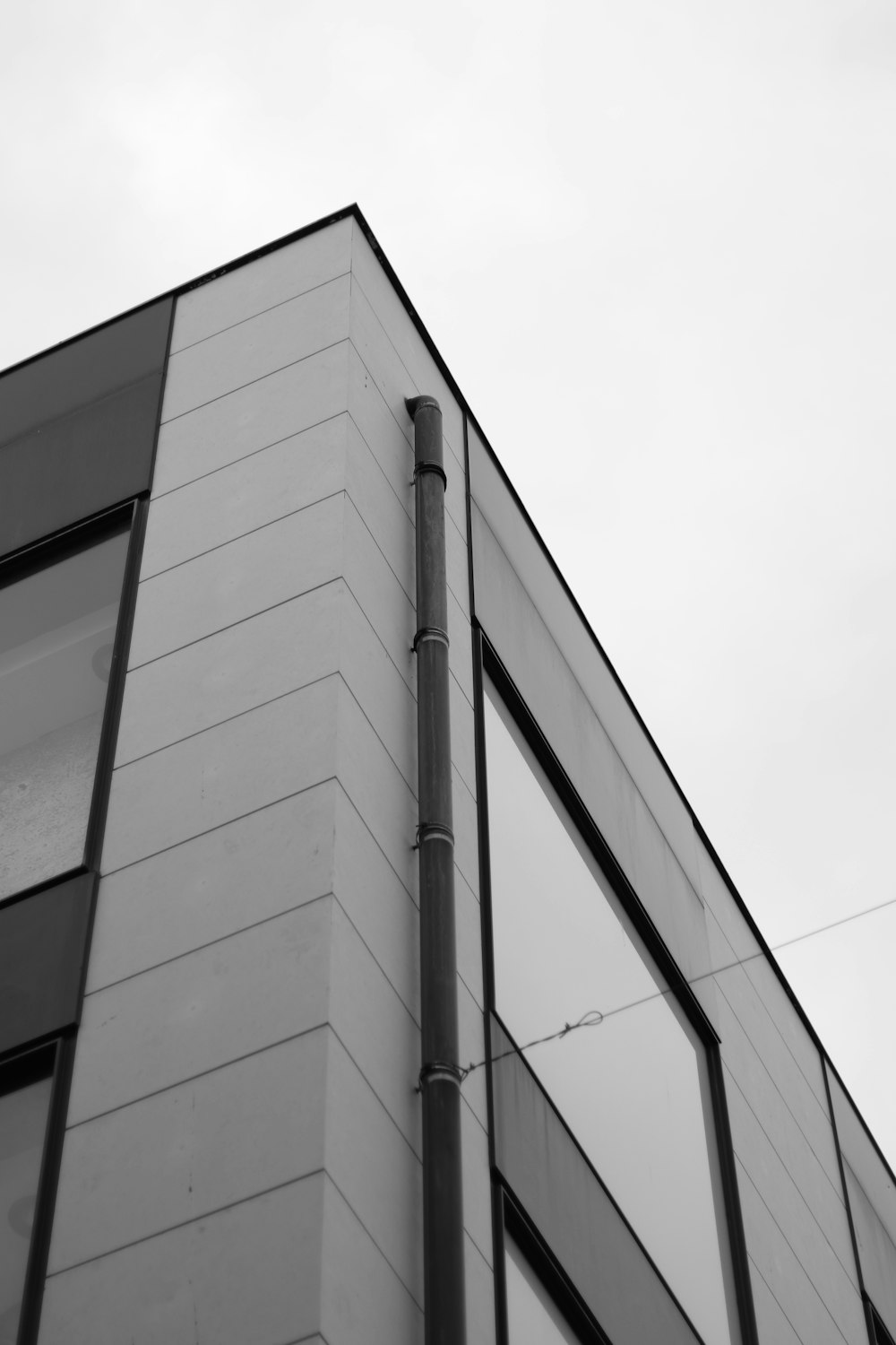 a black and white photo of a tall building