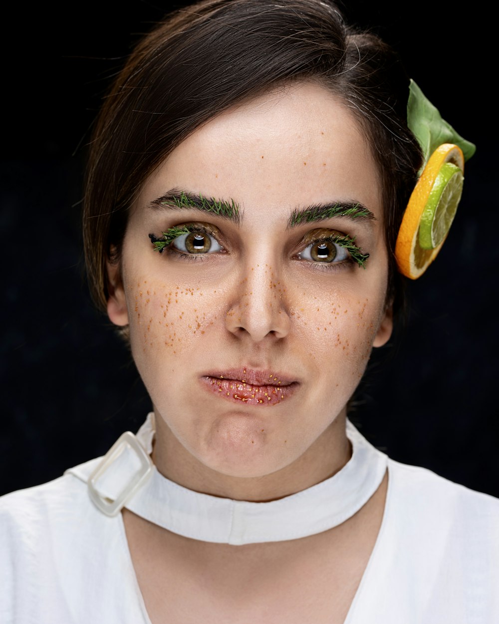 a woman with a piece of fruit on her head