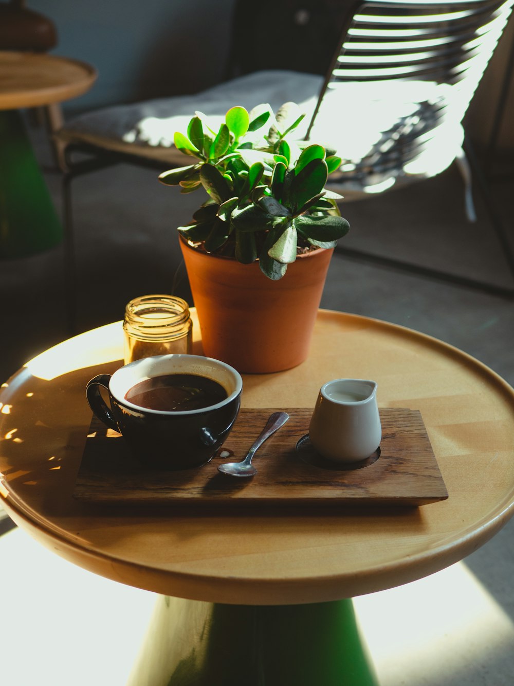 brown ceramic cup on brown wooden table