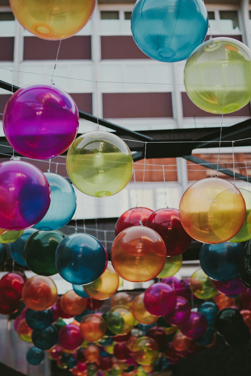 pink blue yellow and green balloons