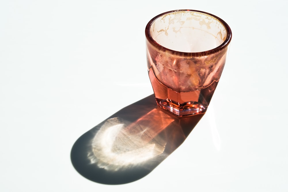 a shot glass sitting on top of a table