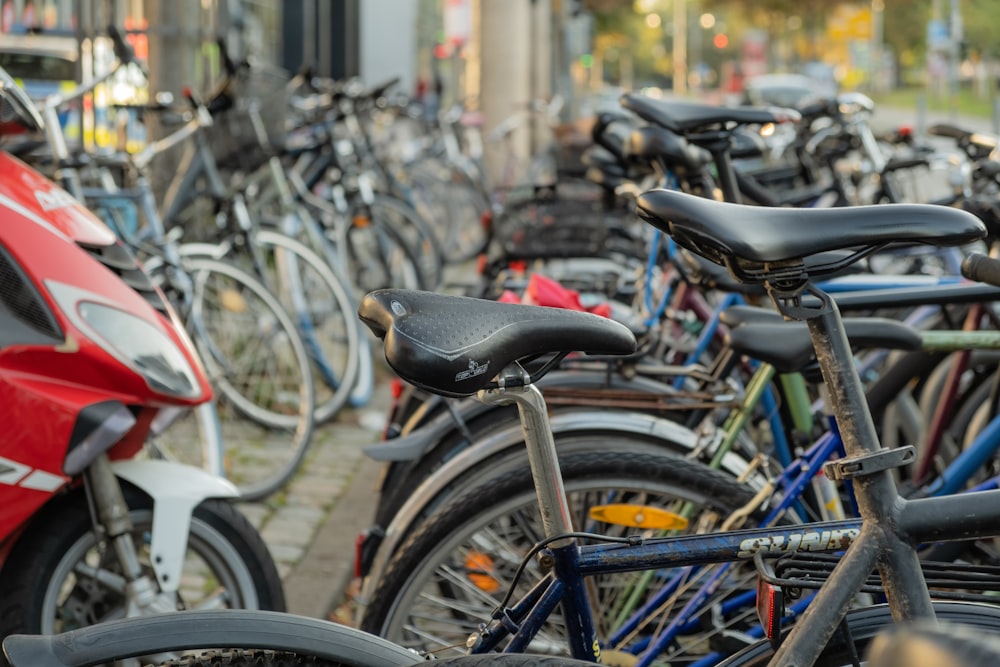 a bunch of bikes parked next to each other