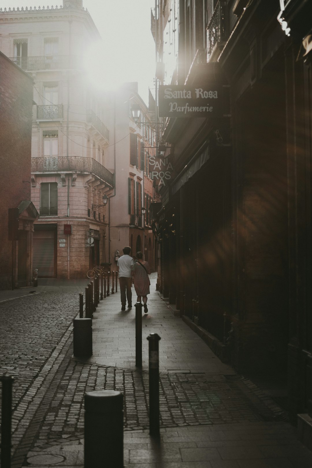 people walking on sidewalk during daytime