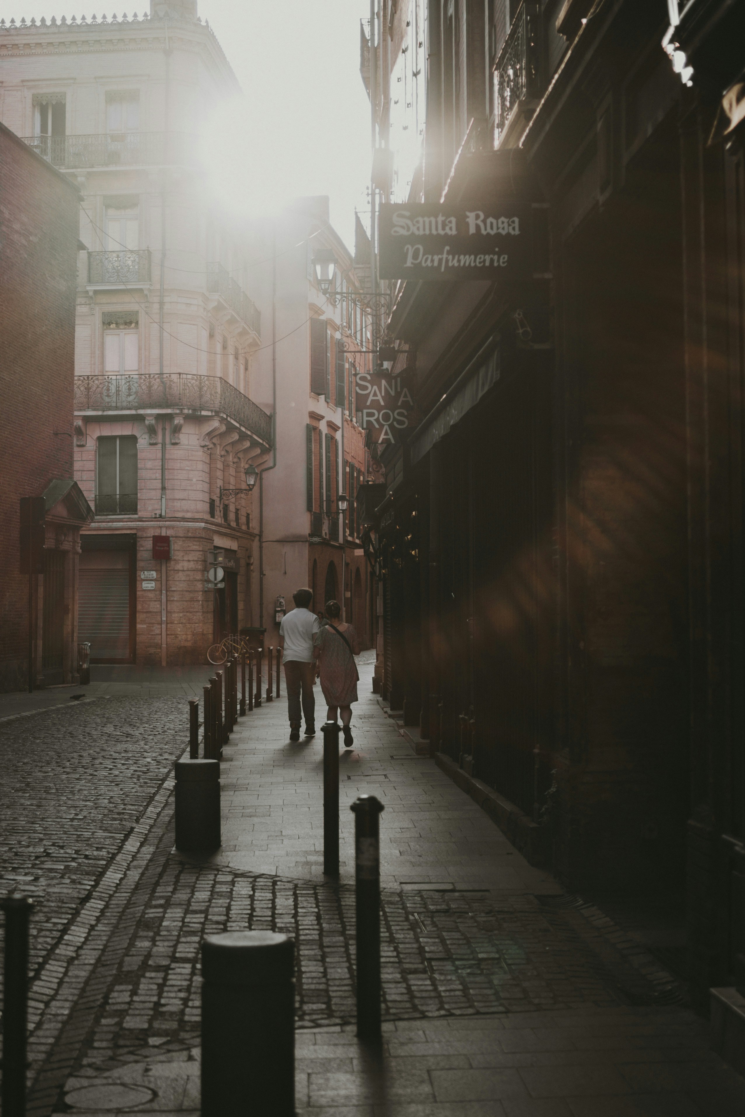 people walking on sidewalk during daytime