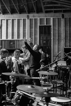 a black and white photo of a band playing