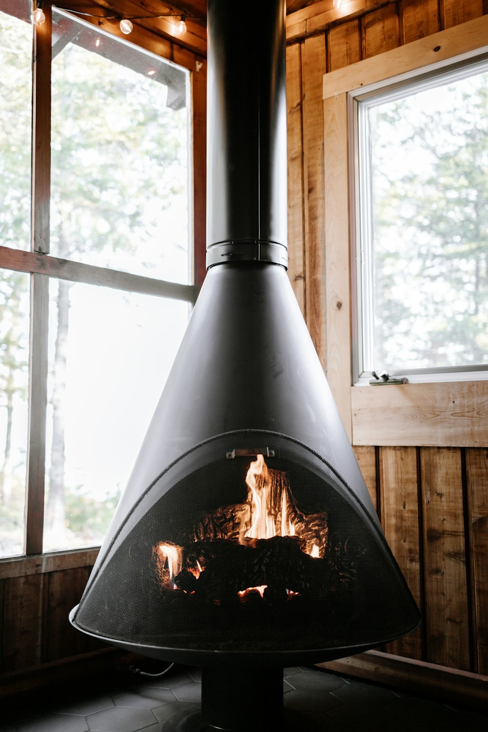 black fire place near window