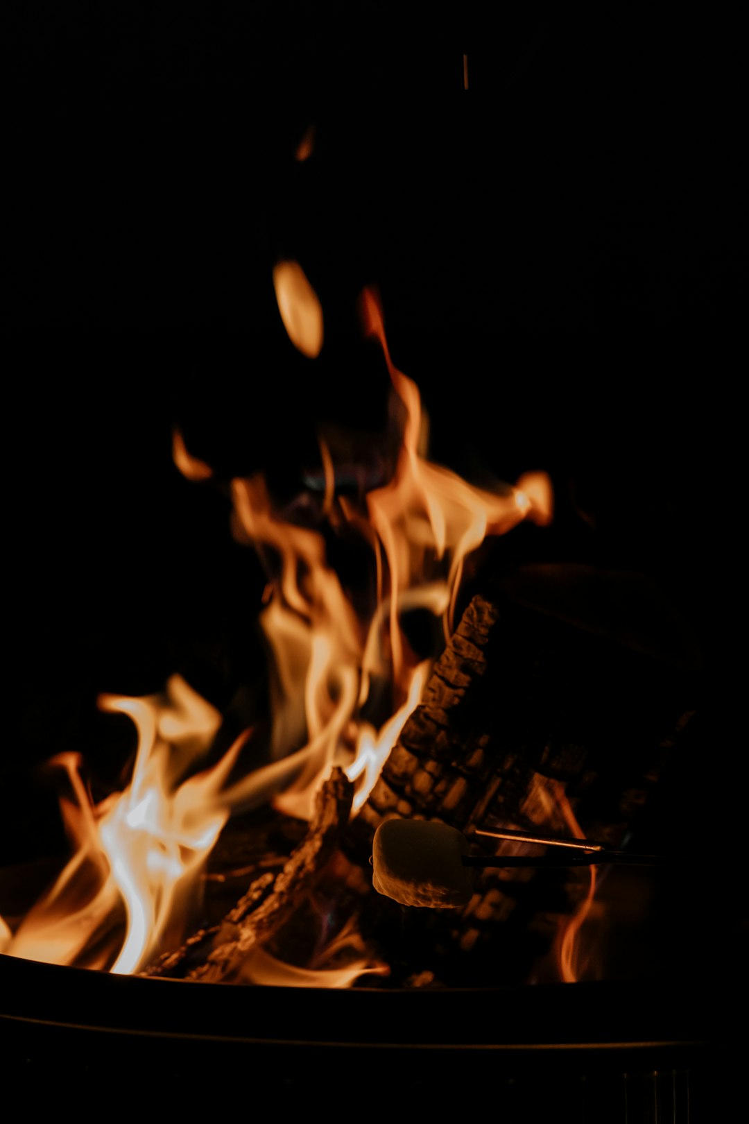 fire on brown wooden table