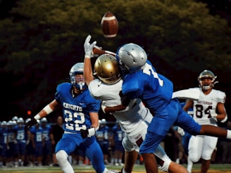 football players in blue and white jersey shirt