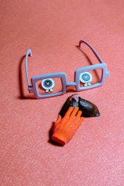 orange and black plastic hair clip