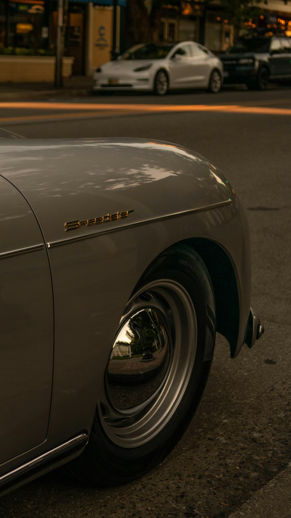 silver car on gray asphalt road during daytime