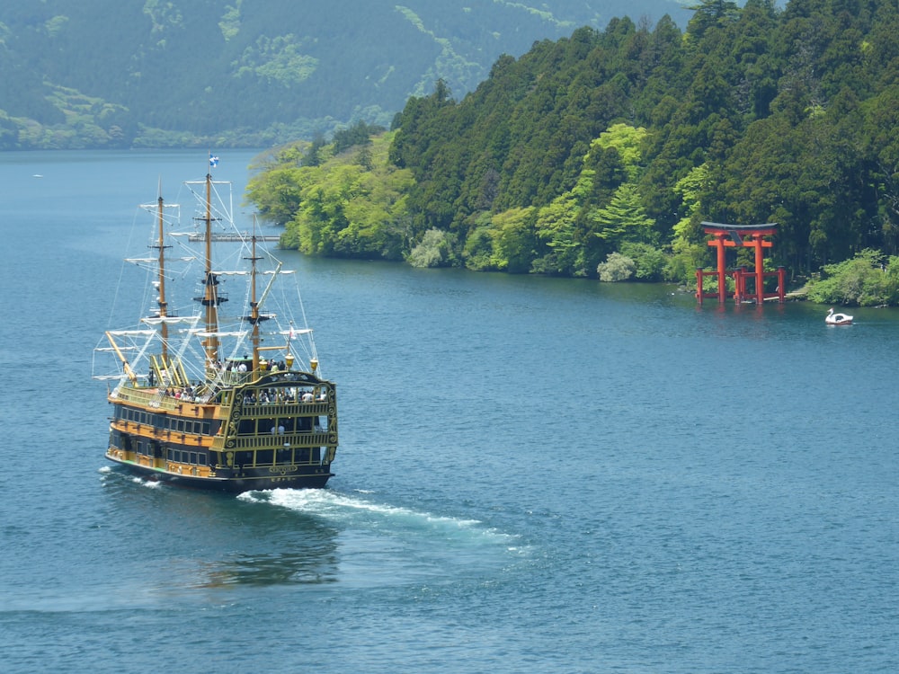 a pirate ship sailing in the middle of a lake