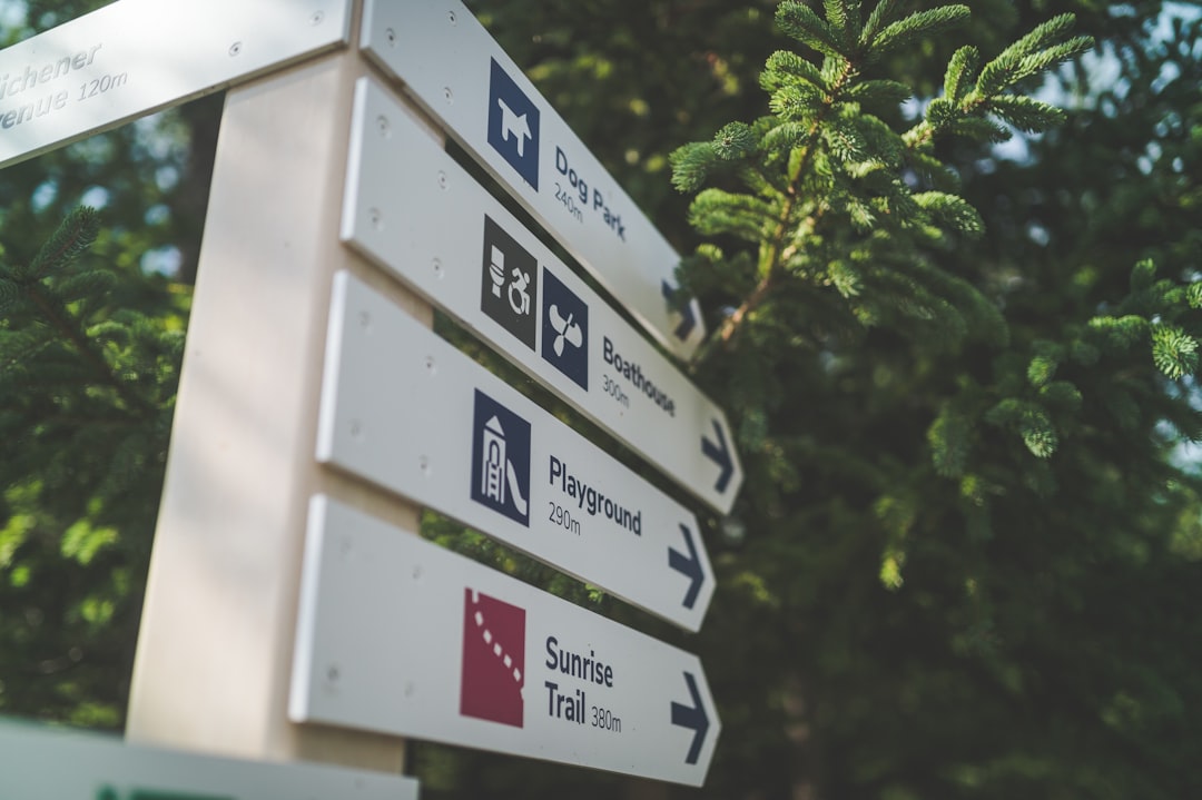 white and black wooden signage