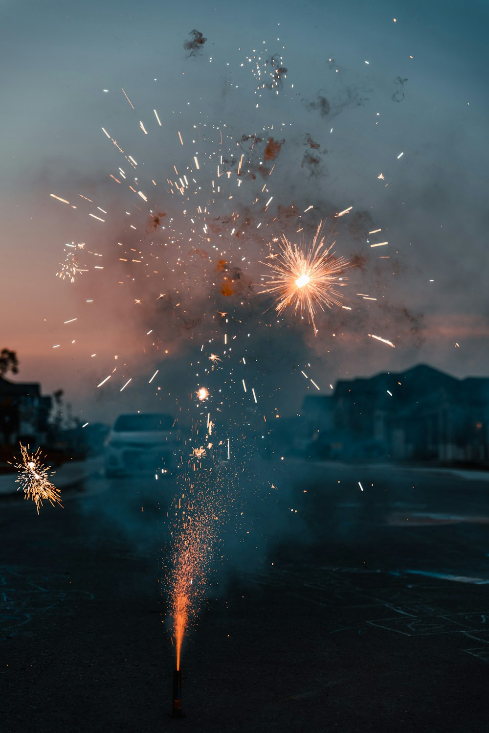 fireworks display over the city during night time