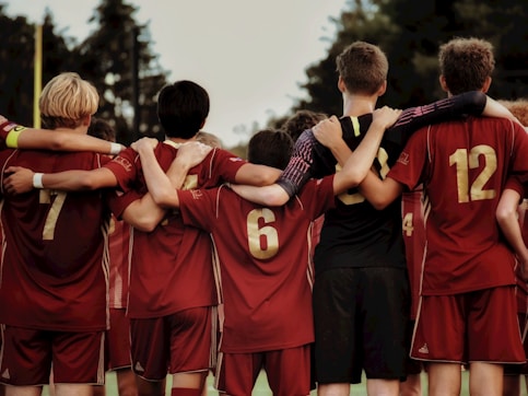 boys in red jersey shirts