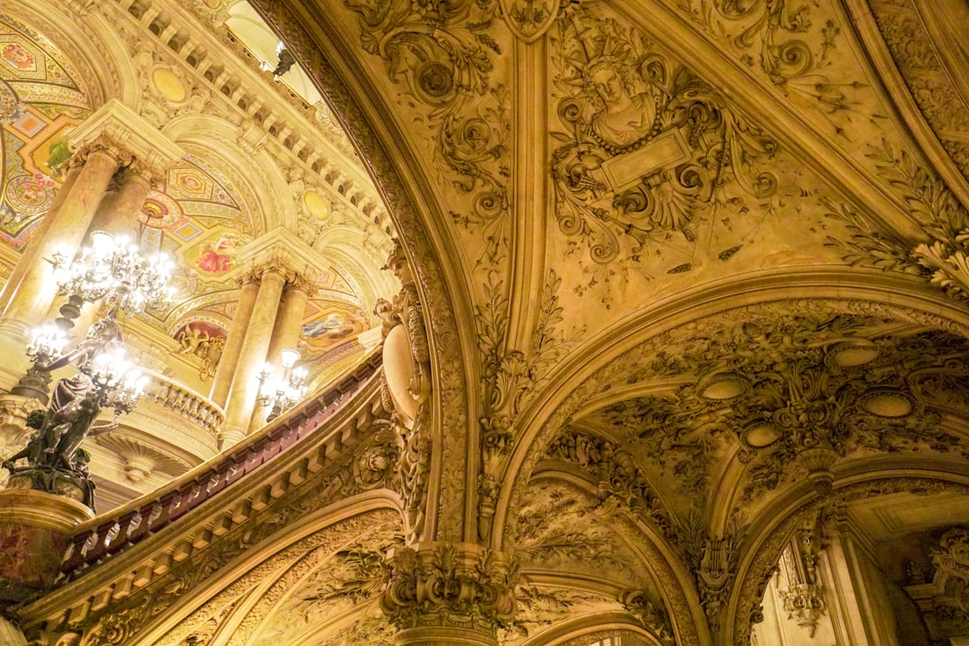 gold and white ceiling with glass ceiling