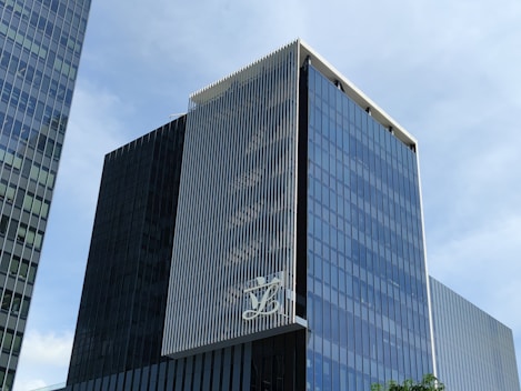 A modern office building with Gigatron branding, symbolizing global IT connectivity.