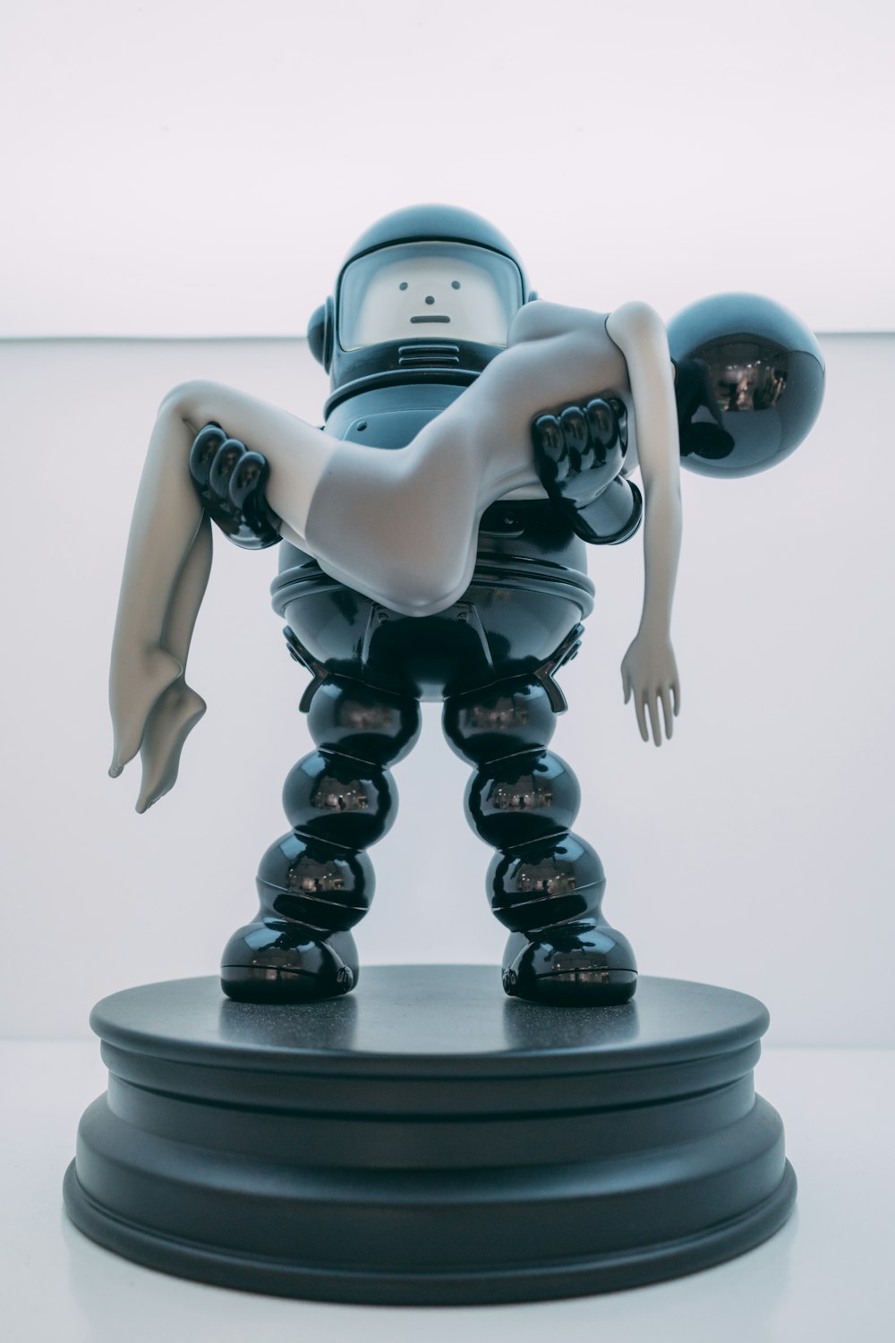 black and white robot figurine