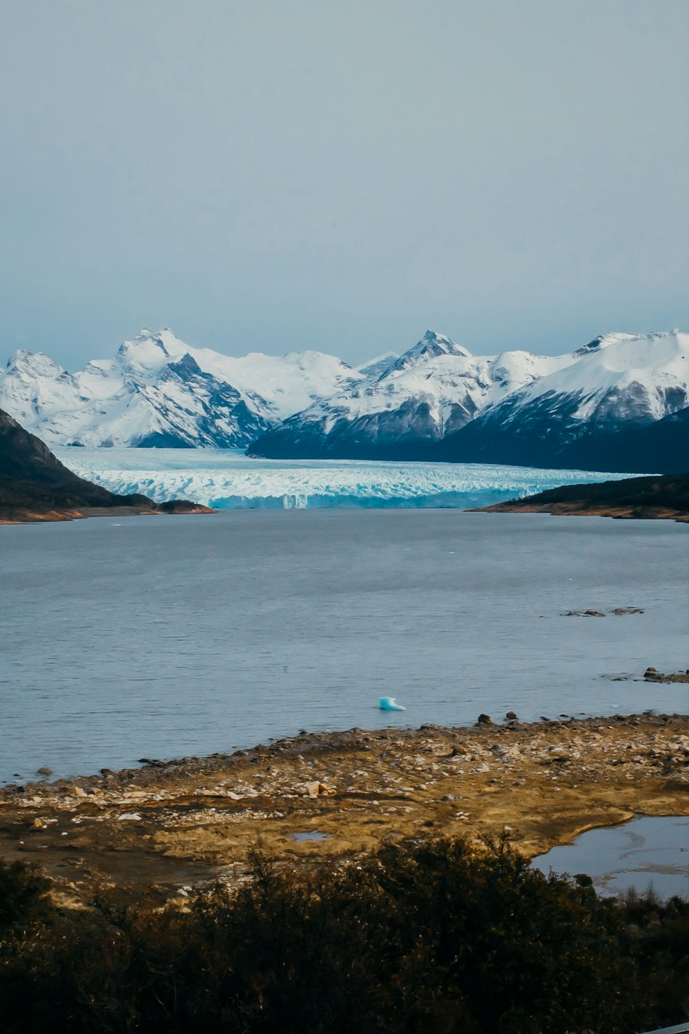 a large body of water surrounded by mountains