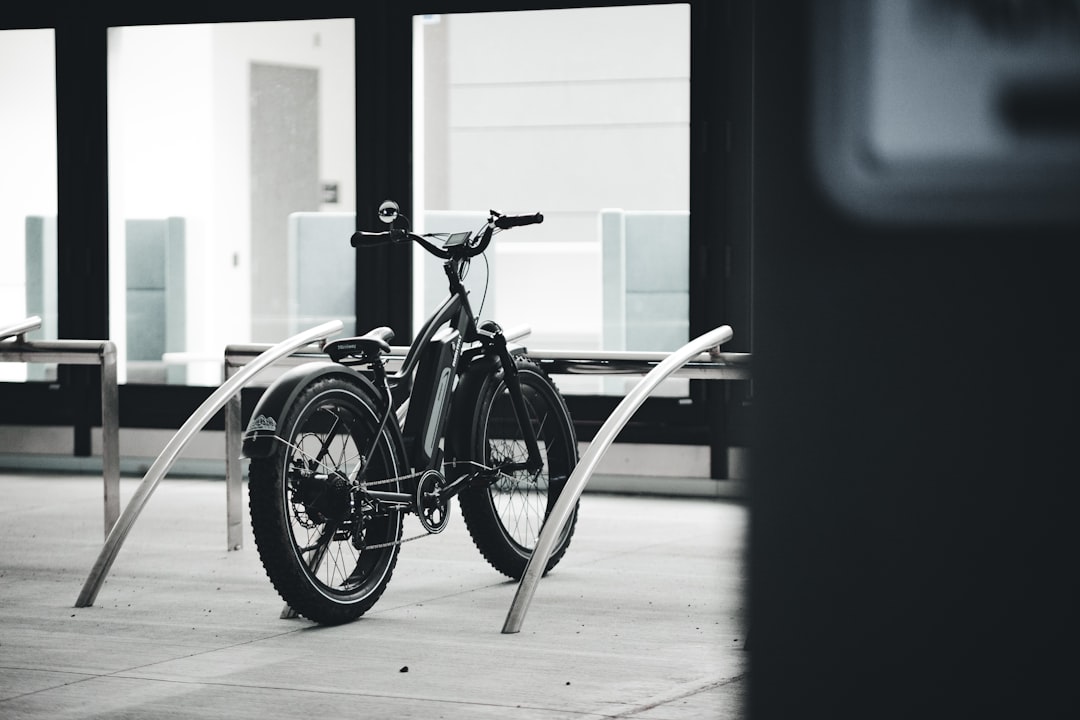 black commuter bike in a room