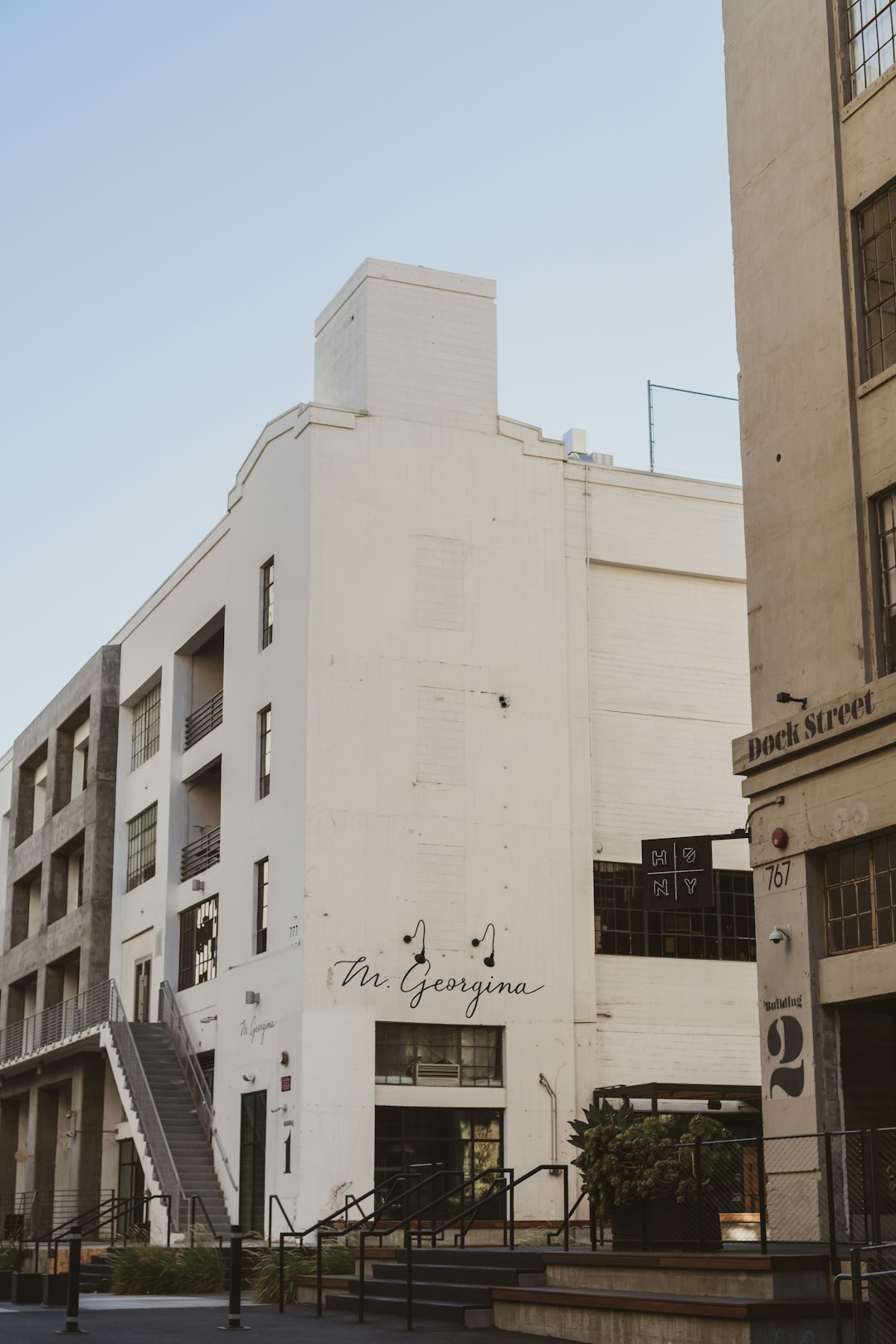 white concrete building under blue sky during daytime