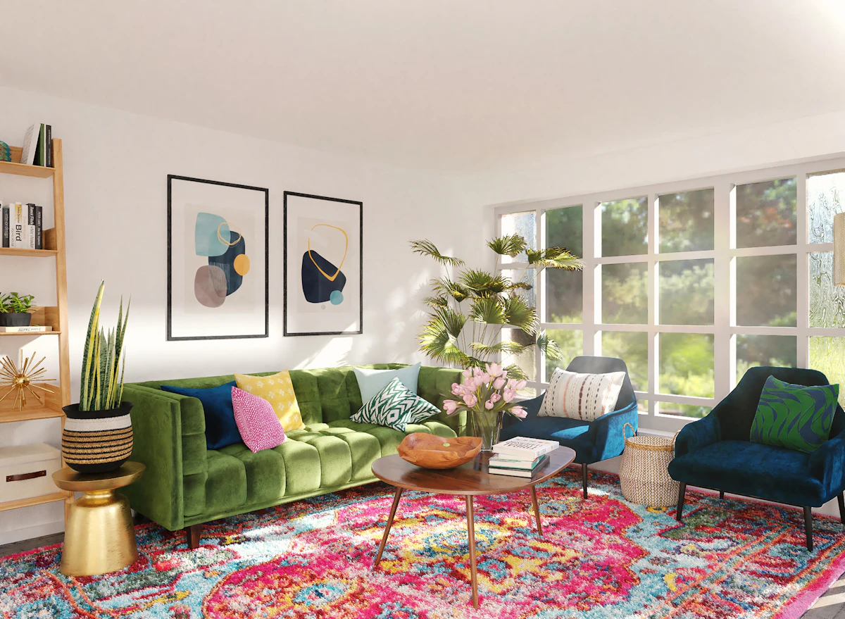 Interior sitting room with soft green walls, a green armchair and a wooden side table