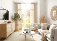 white and gray sofa chair near window