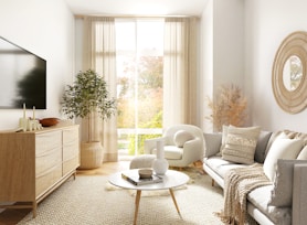 white and gray sofa chair near window